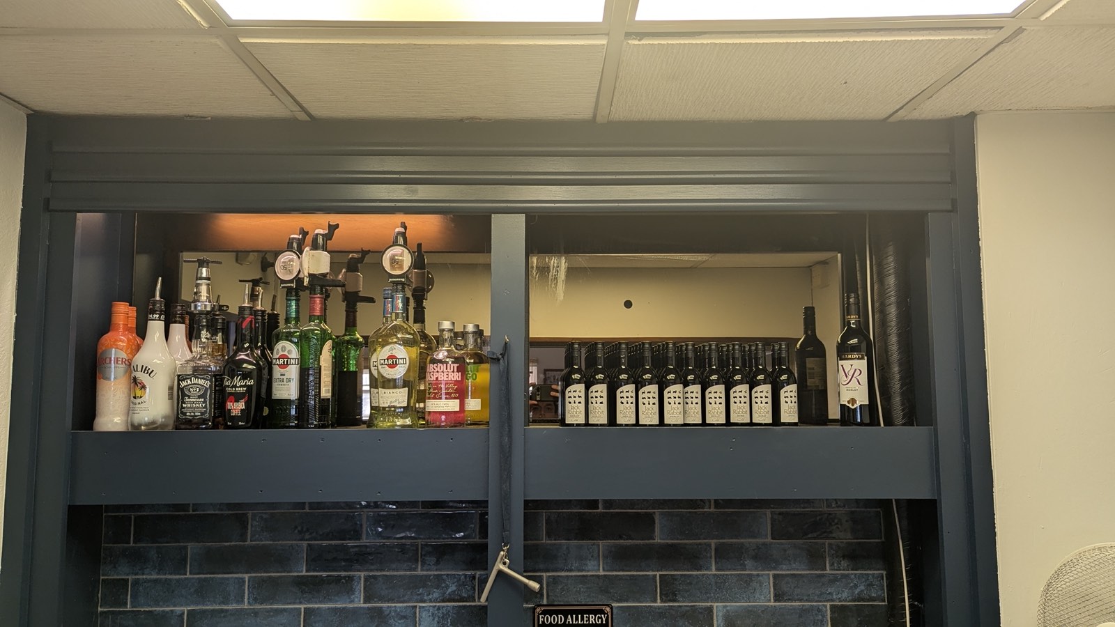 Spirits shelf behind the bar
